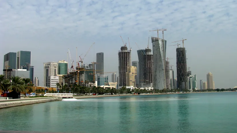 Tower cranes over buildings under construction in central Doha