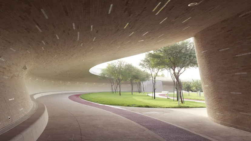 Oxygen Park in Education City, Doha, a modern walkway curving under a landscaped roof